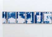 Klara Meinhardt: Fries, 2019, 25 + two half cyanotypes on paper, steel frame, each 45 x 33 cm, total length 916 cm

